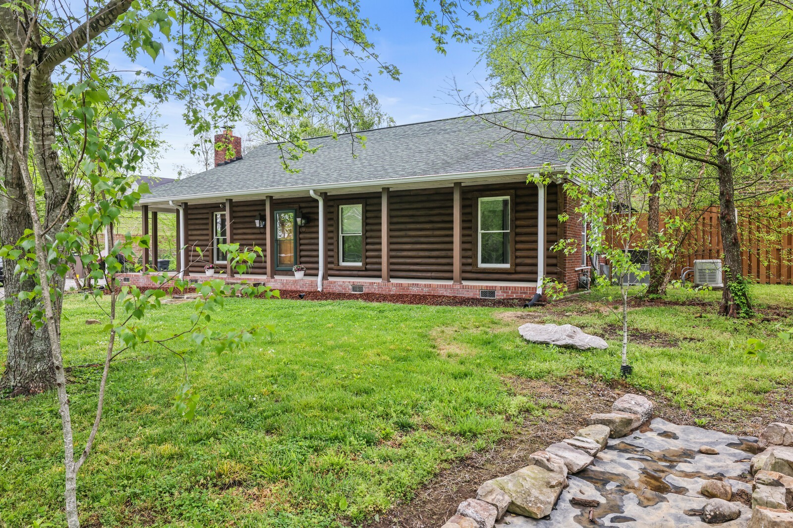 5700 Cane Ridge Road Antioch, TN 37013 - Photo 3 of 61 front view of a house with a yard