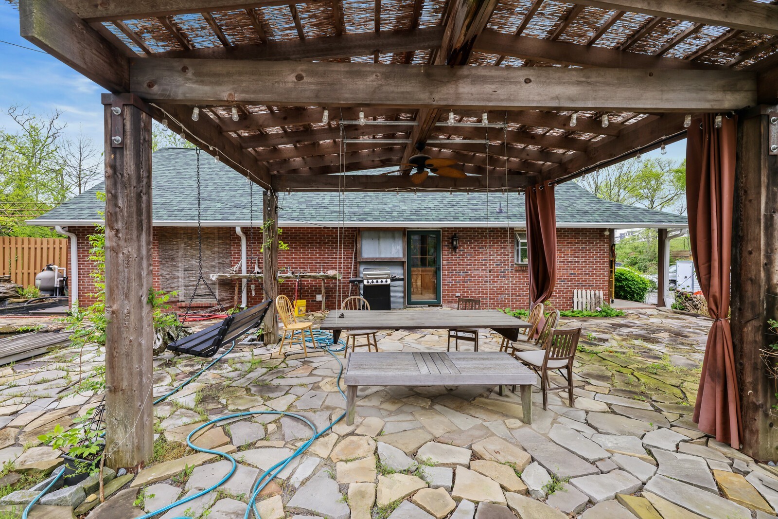 5700 Cane Ridge Road Antioch, TN 37013 - Photo 32 of 61 a view of a backyard with sitting area and furniture