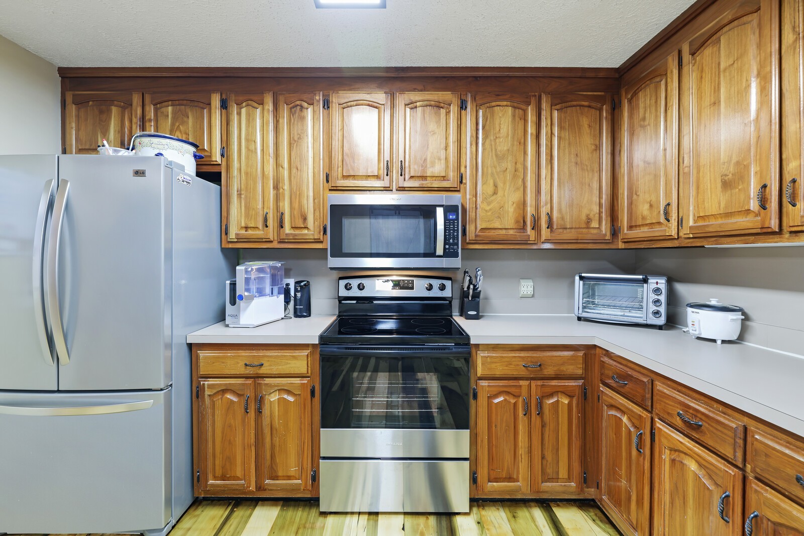 5700 Cane Ridge Road Antioch, TN 37013 - Photo 9 of 61 a kitchen with stainless steel appliances granite countertop a refrigerator a stove a sink and dishwasher