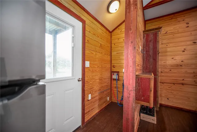 a bathroom with a shower and a sink