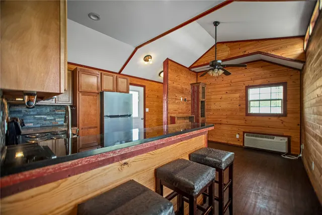 a view of livingroom with furniture and windows