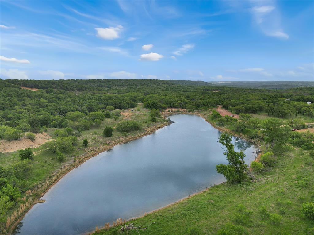 Tbd Tbd Tenbears Court Mingus, TX 76463 - Photo 11 of 20 a view of a lake with a yard