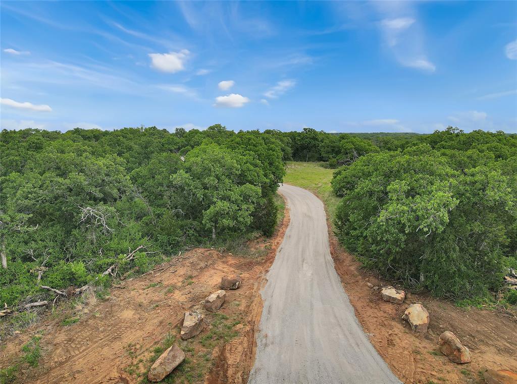 Tbd Tbd Tenbears Court Mingus, TX 76463 - Photo 9 of 20 a view of a lake with a yard