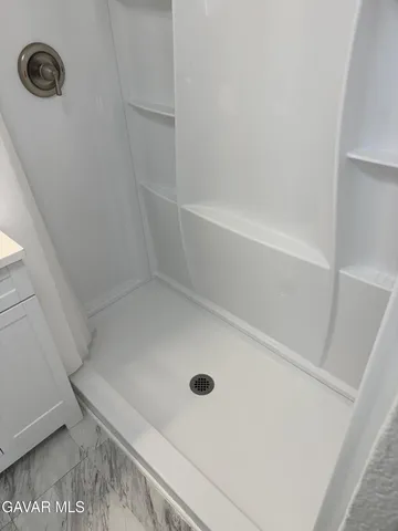 a bathroom with a tub