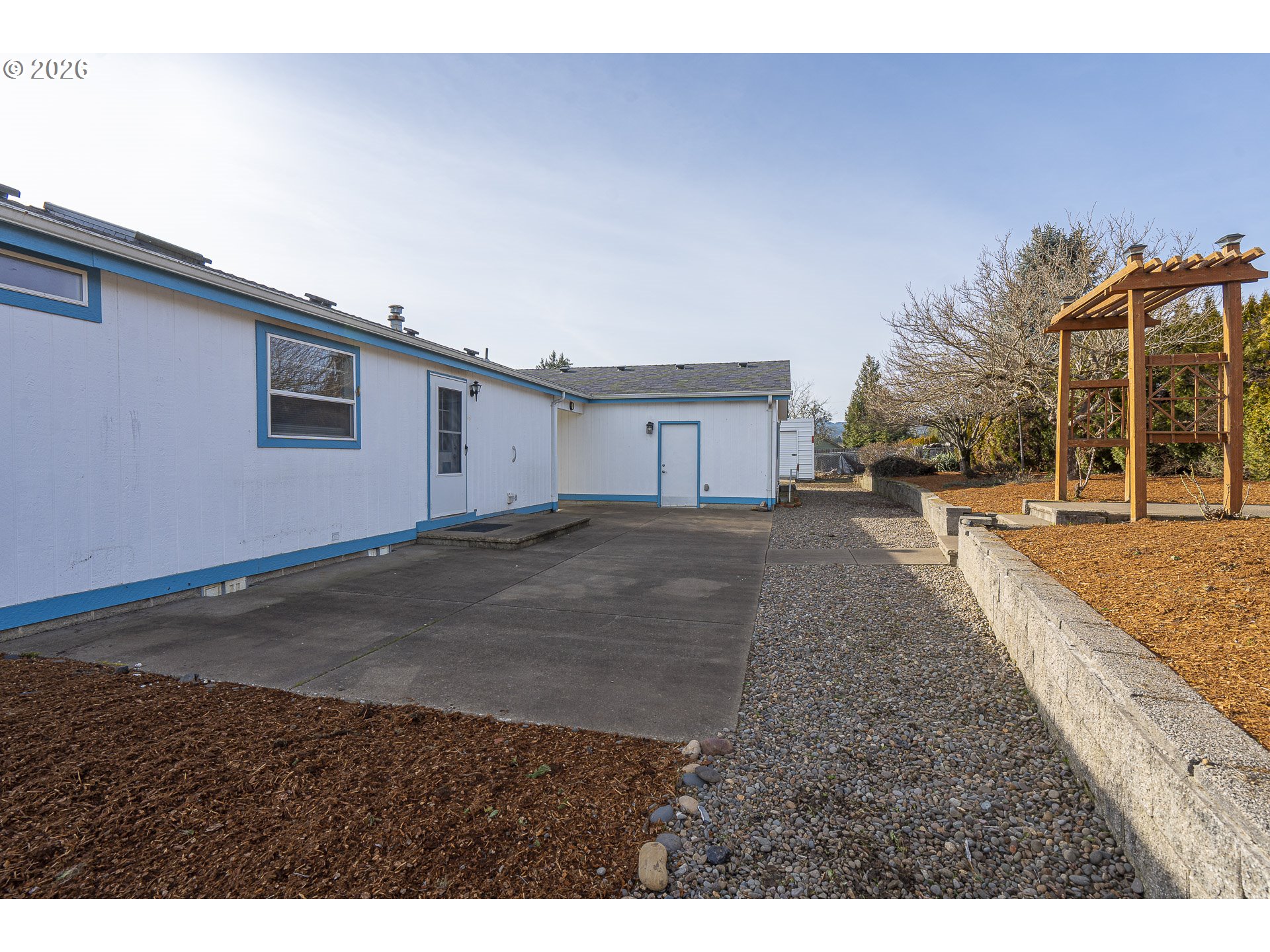 860 West Ellendale Avenue Dallas, OR 97338 - Photo 11 of 33 a view of an house with backyard and road