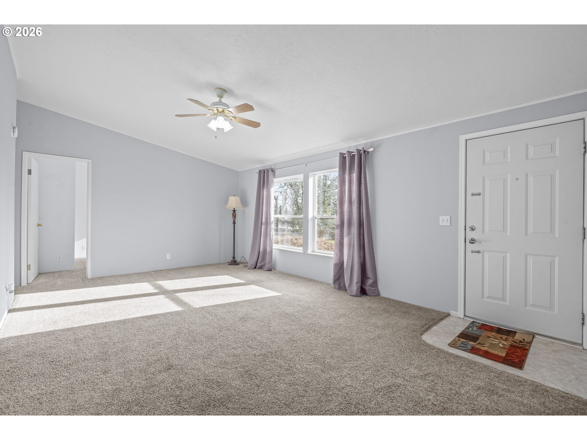 860 West Ellendale Avenue Dallas, OR 97338 - Photo 15 of 33 a view of an empty room with a window