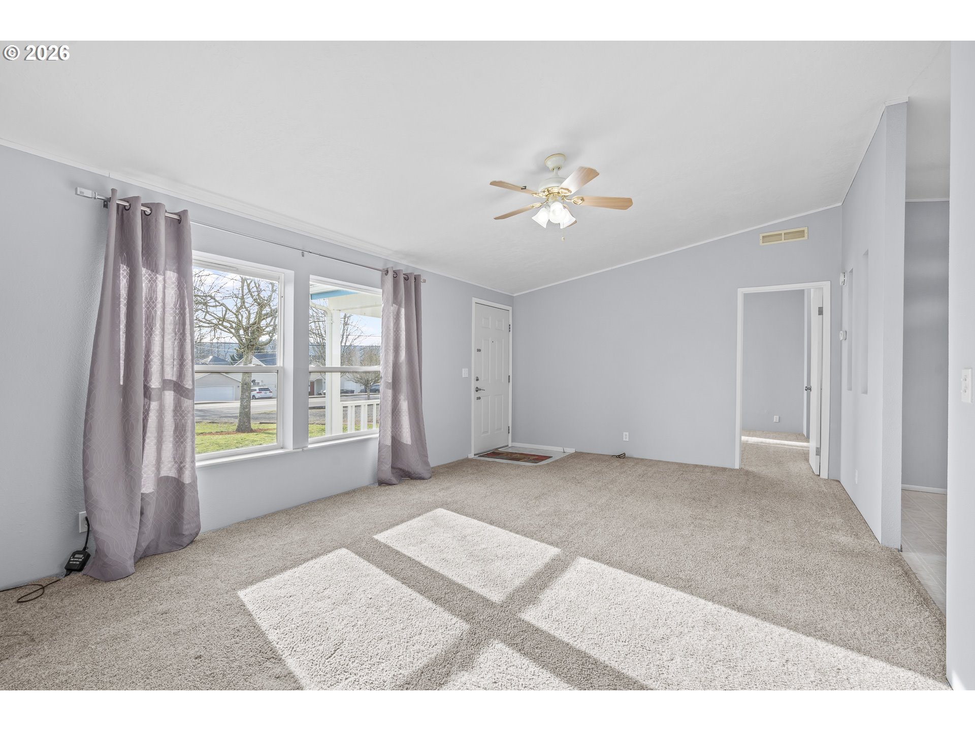 860 West Ellendale Avenue Dallas, OR 97338 - Photo 16 of 33 a view of an empty room with a window