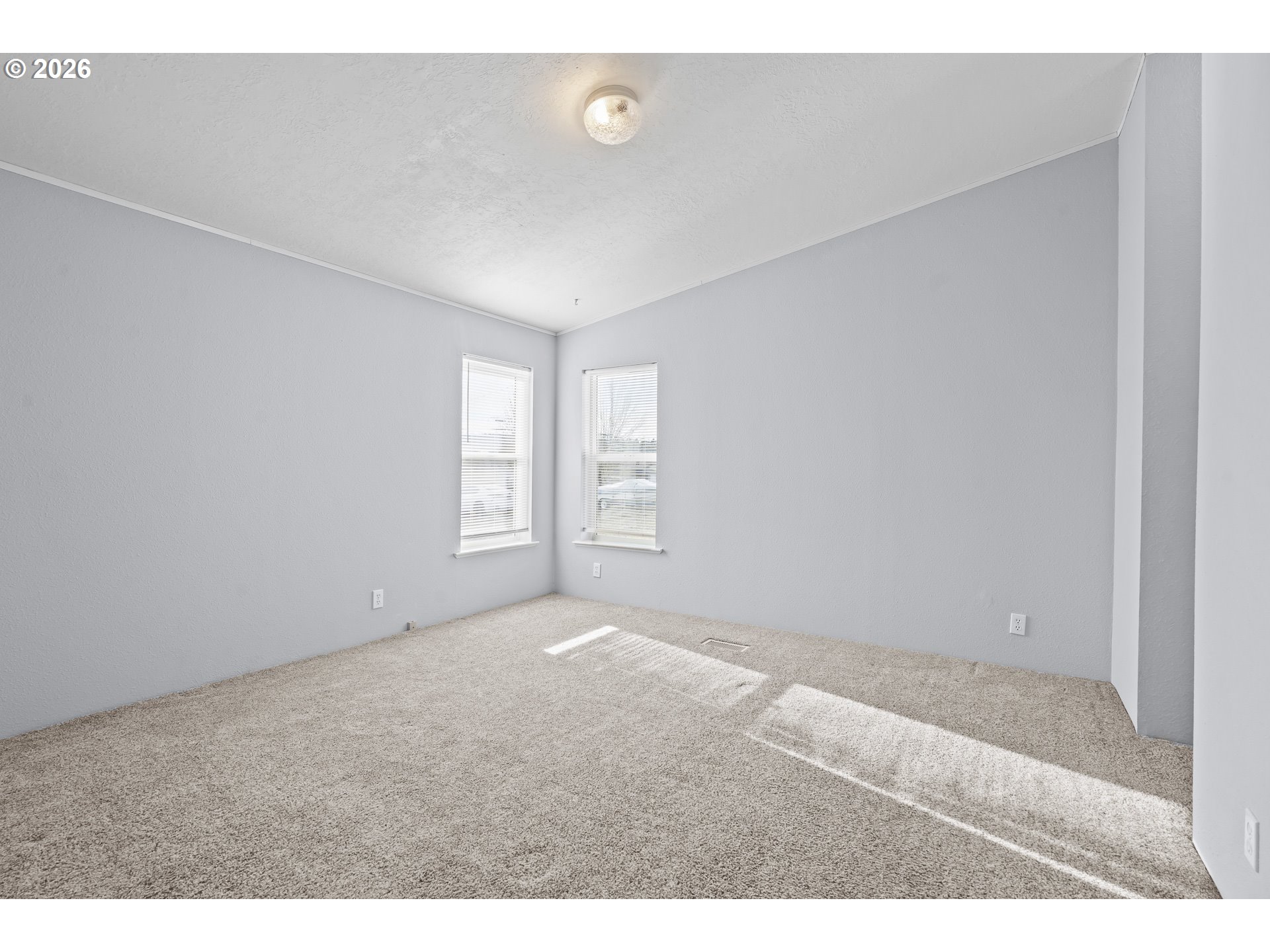 860 West Ellendale Avenue Dallas, OR 97338 - Photo 25 of 33 a view of an empty room with a window