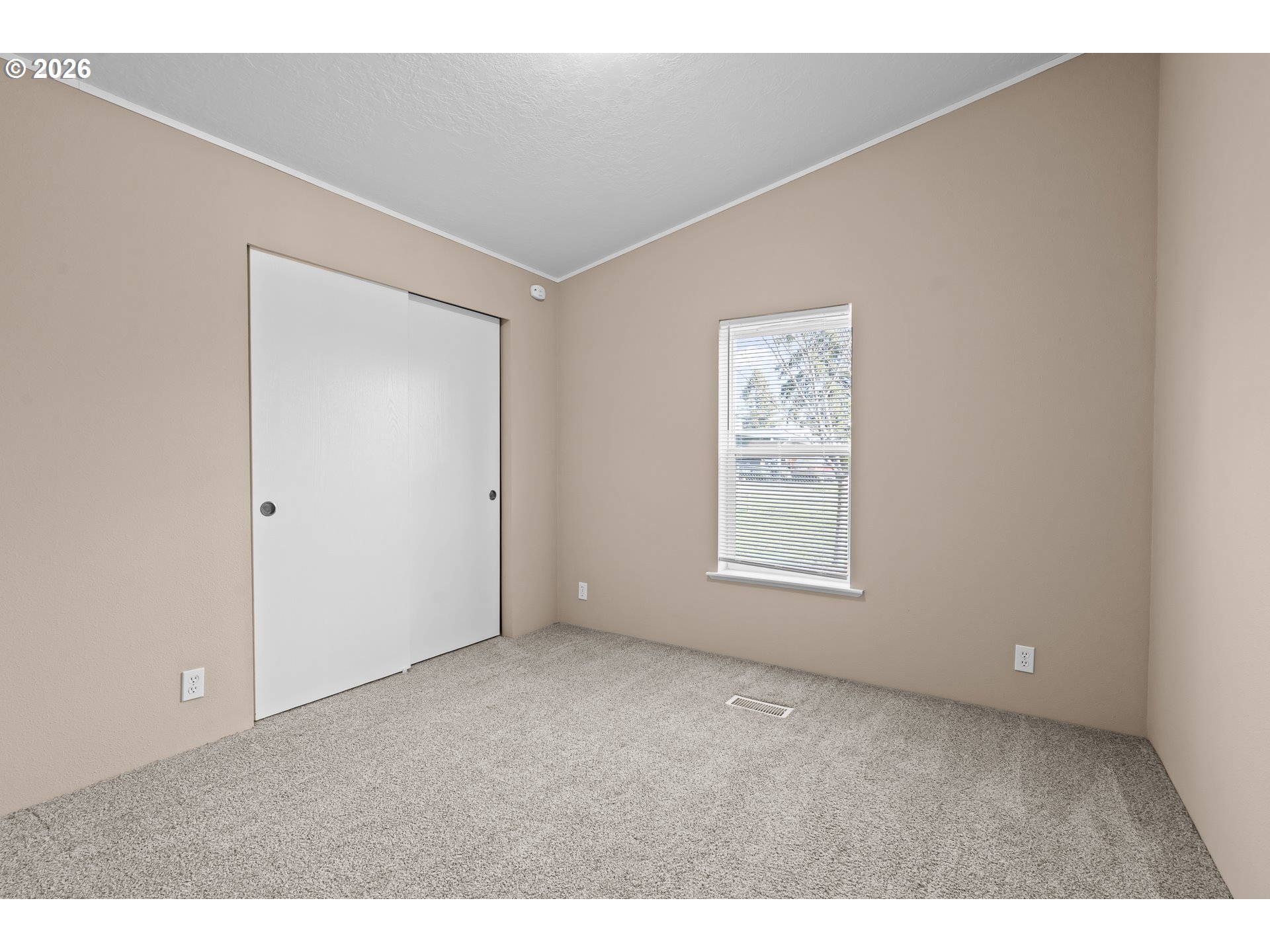 860 West Ellendale Avenue Dallas, OR 97338 - Photo 30 of 33 a view of an empty room with a window