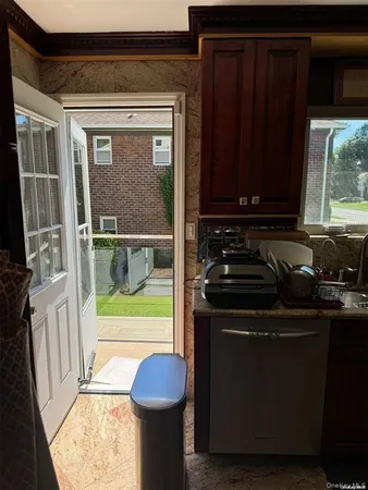 a kitchen with a sink and a stove
