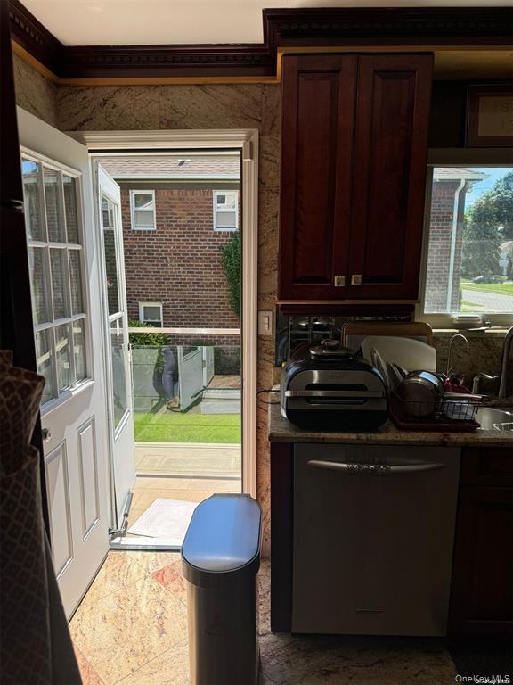 830 Pepperidge Road Westbury, NY 11590 - Photo 12 of 15 a kitchen with a sink and a stove