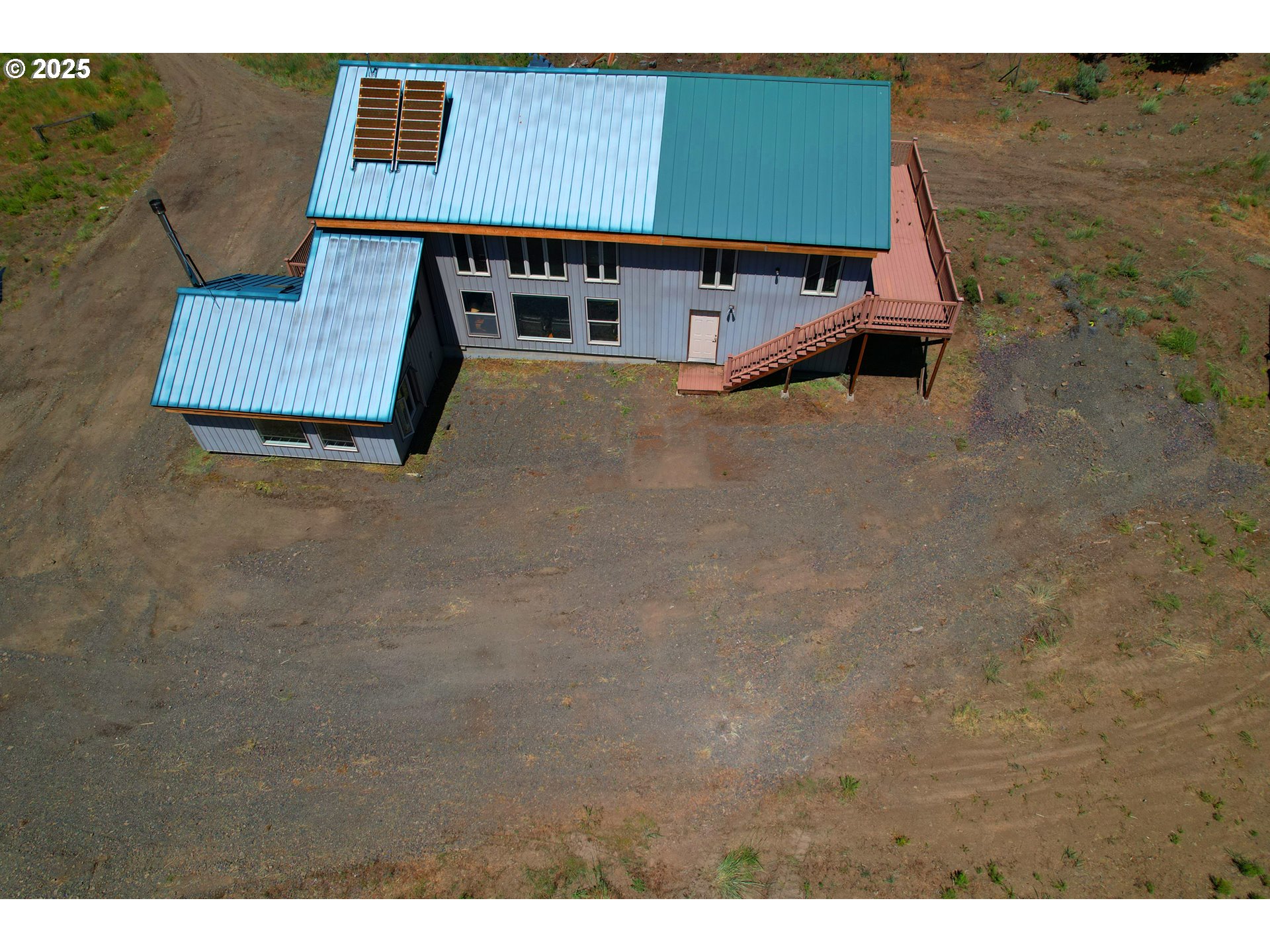 12142 Burns-Izee Road Seneca, OR 97873 - Photo 31 of 40 an aerial view of a house with swimming pool
