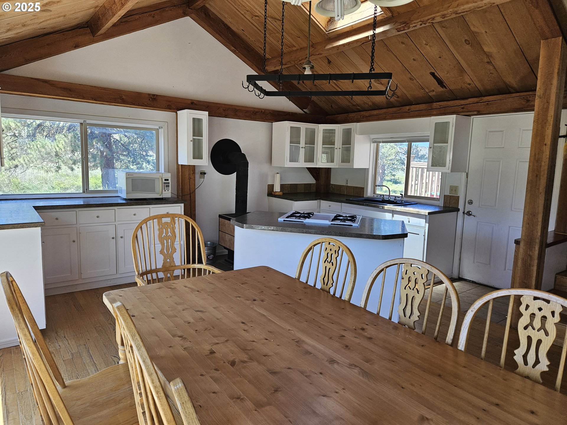12142 Burns-Izee Road Seneca, OR 97873 - Photo 34 of 40 a view of a dining room with furniture window and outside view