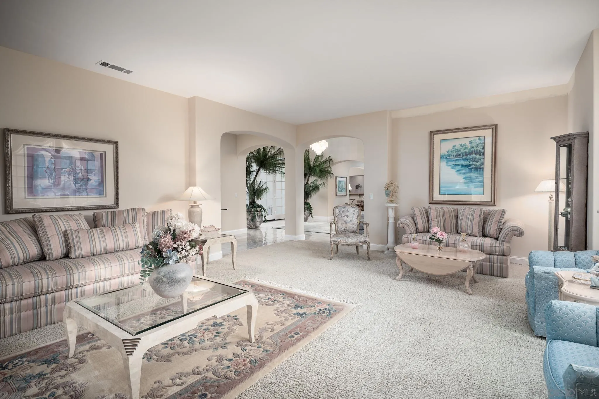 18221 Via Ascenso Rancho Santa Fe, CA 92067 - Photo 9 of 37 a living room with furniture and a couch