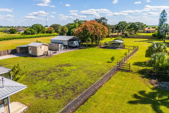 a view of a lake with couches and city view