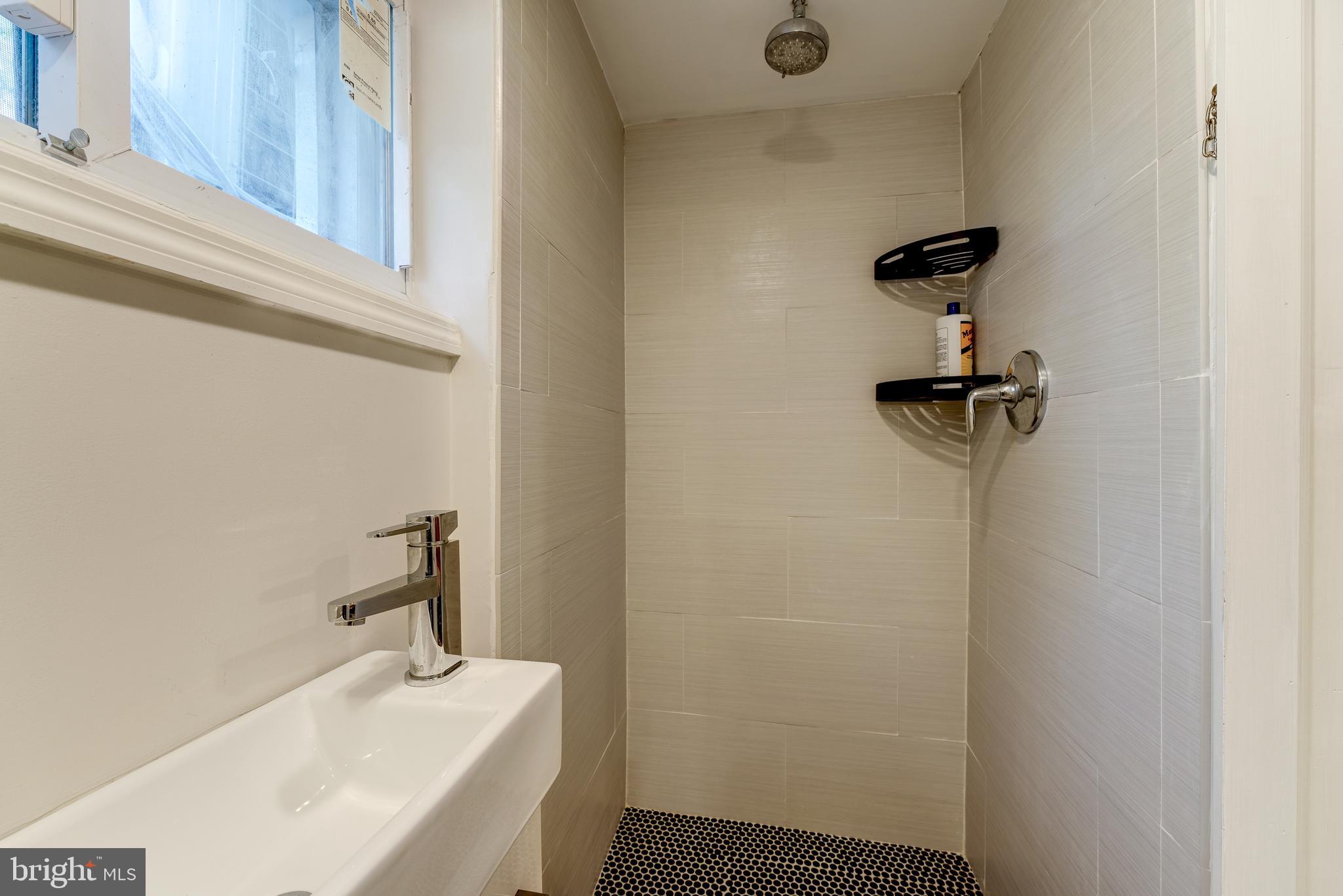 2339 3rd Street Northeast Washington, DC 20002 - Photo 34 of 59 Custom-tiled Shower!