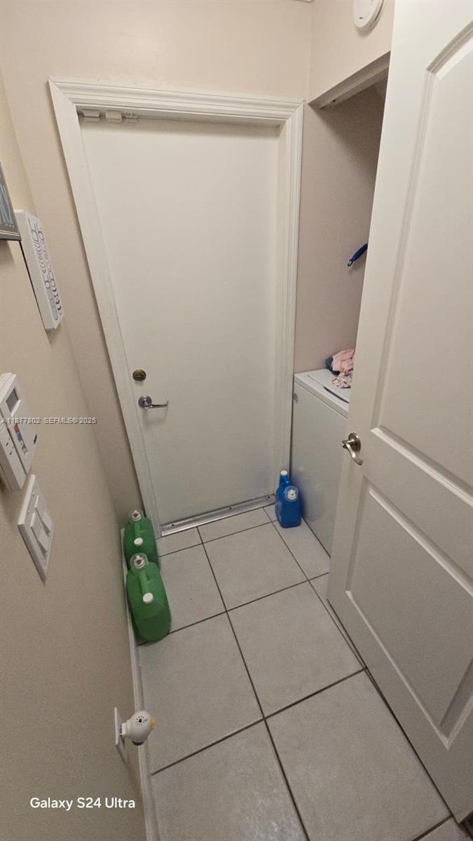 15436 Southwest 151st Terrace Miami, FL 33196 - Photo 28 of 50 a bathroom with a sink and a mirror