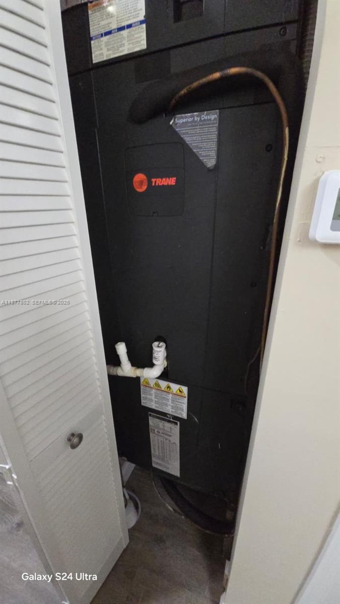 15436 Southwest 151st Terrace Miami, FL 33196 - Photo 29 of 50 a bathroom with a sink and toilet