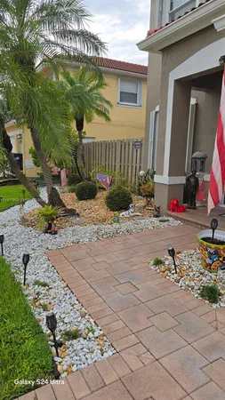a view of garden with patio