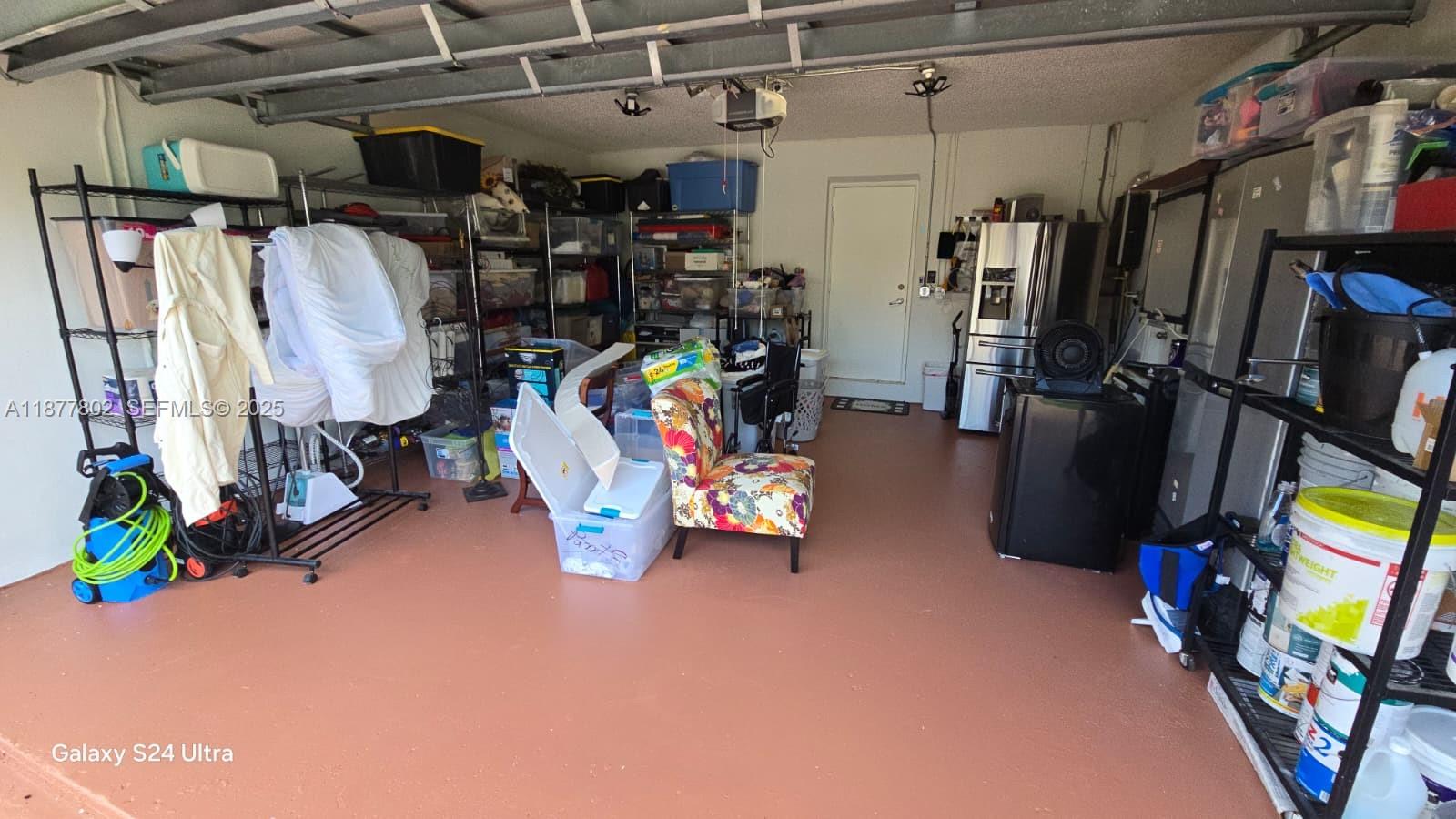 15436 Southwest 151st Terrace Miami, FL 33196 - Photo 47 of 50 a view of a storage room with a lot of stuff