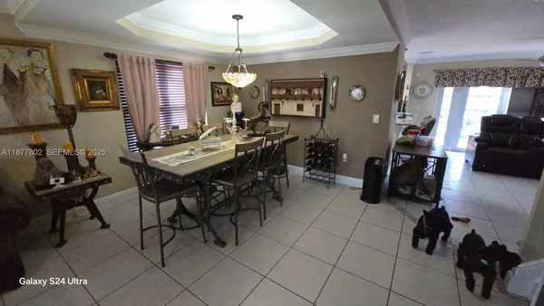 a view of a livingroom with furniture and window