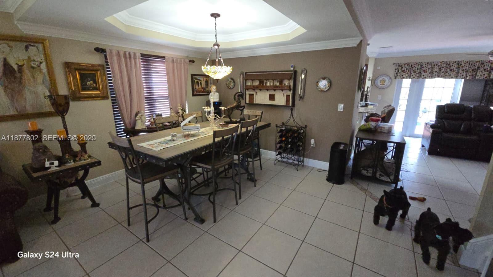 15436 Southwest 151st Terrace Miami, FL 33196 - Photo 5 of 50 a view of a livingroom with furniture and window