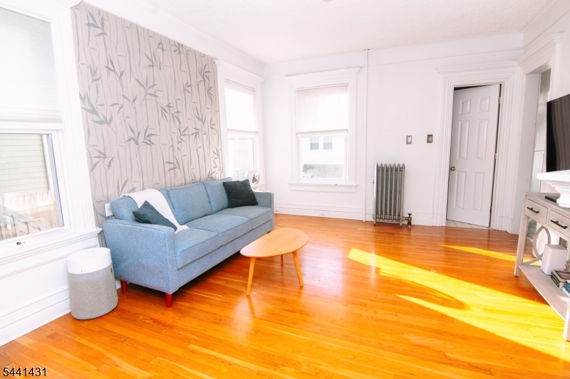 306 Springfield Avenue, Unit 1 Summit, NJ 07901 - Photo 7 of 17 a living room with furniture and a rug