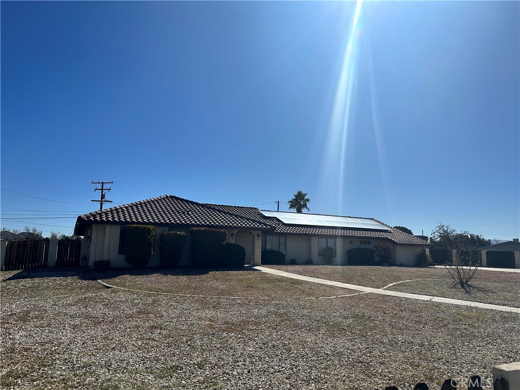 15191 Tuscola Road Apple Valley, CA 92307 - Photo 1 of 1 a front view of a house