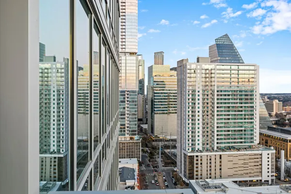 a view of city with tall buildings