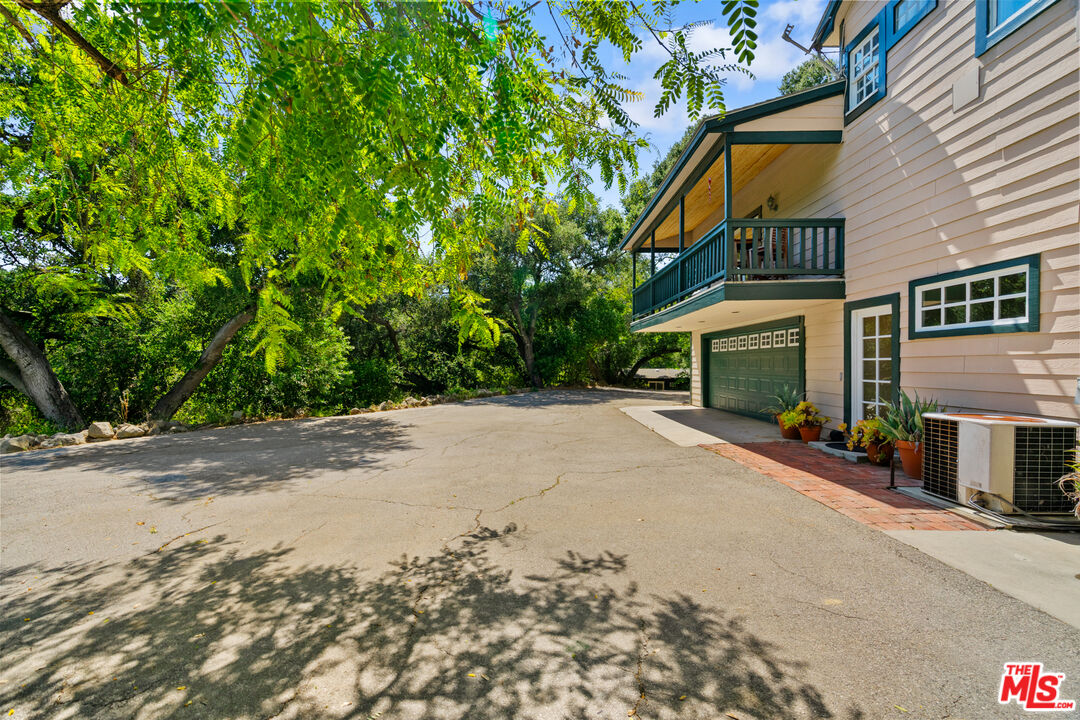 20912 Fontaine Road Topanga, CA 90290 - Photo 39 of 52 a view of a house with a street