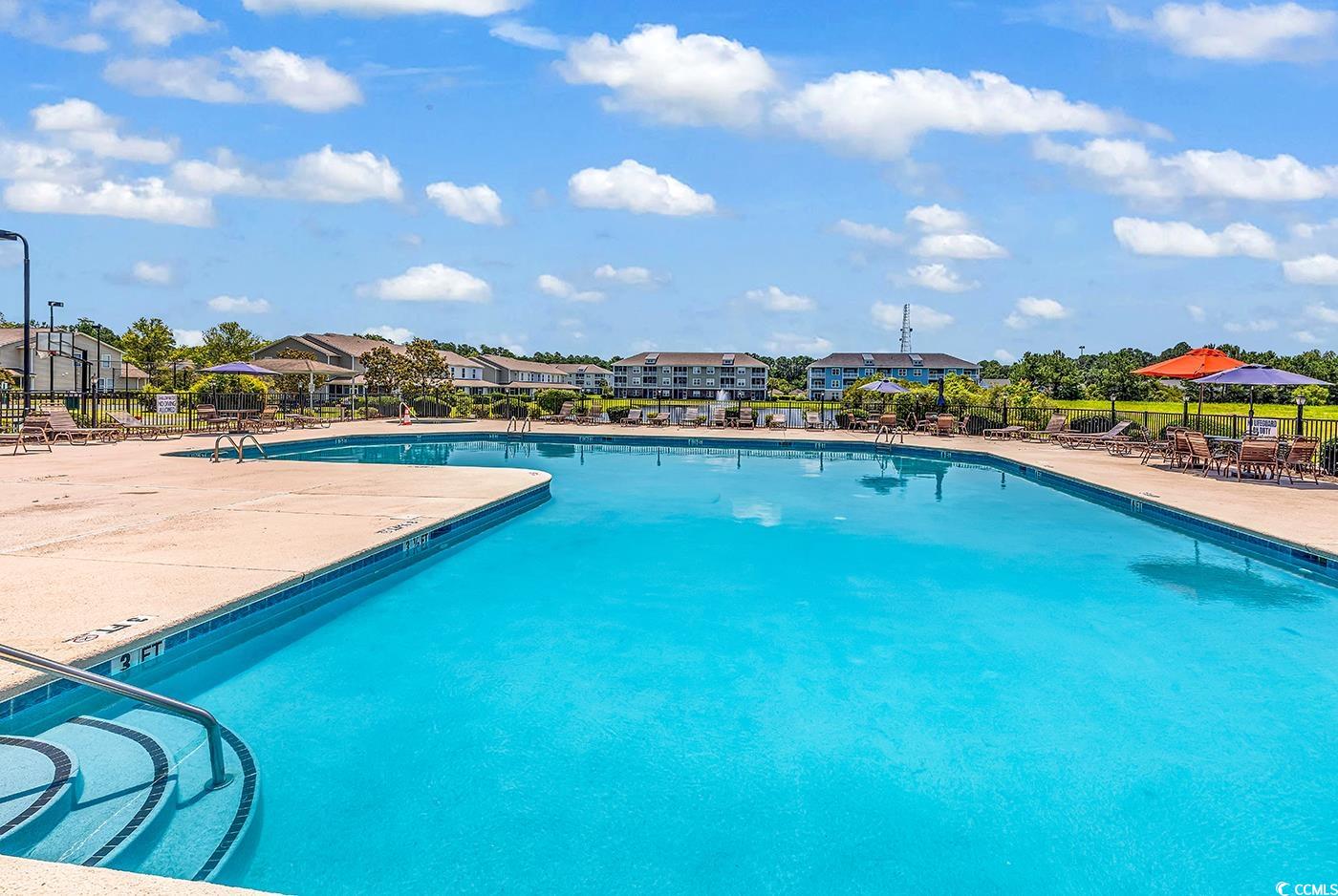 300 Kiskadee Loop, Unit K Conway, SC 29526 - Photo 33 of 40 Community pool with a patio area and a residential