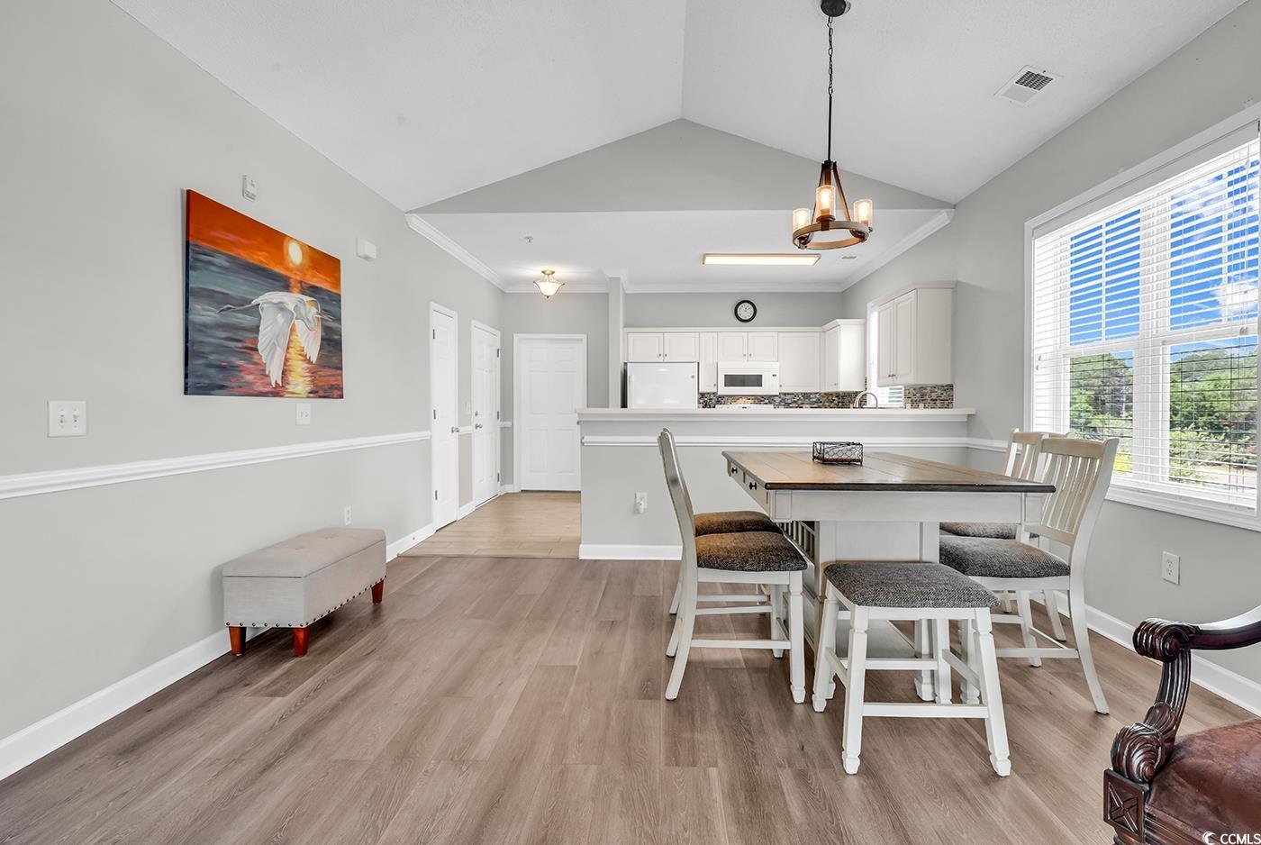 300 Kiskadee Loop, Unit K Conway, SC 29526 - Photo 7 of 40 Dining space featuring light wood finished floors,