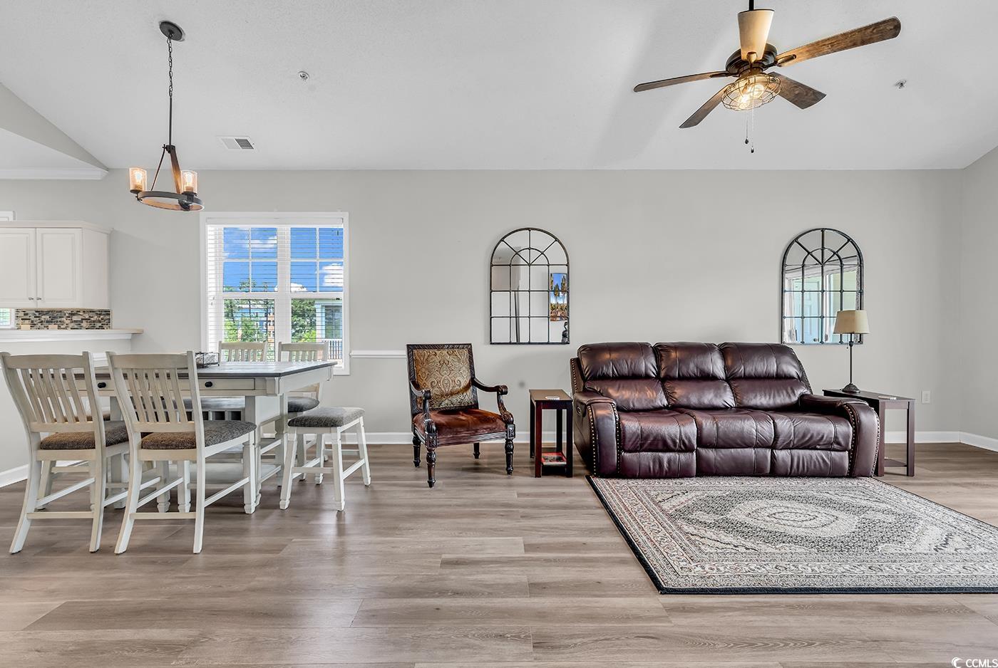 300 Kiskadee Loop, Unit K Conway, SC 29526 - Photo 8 of 40 Living room with a ceiling fan, light wood-type fl