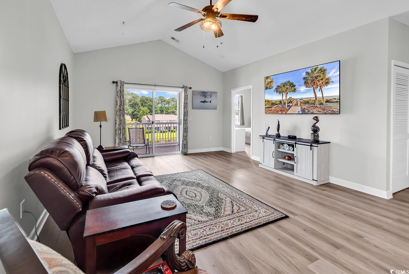 300 Kiskadee Loop, Unit K Conway, SC 29526 - Photo 9 of 40 Living area featuring ceiling fan, light wood-styl