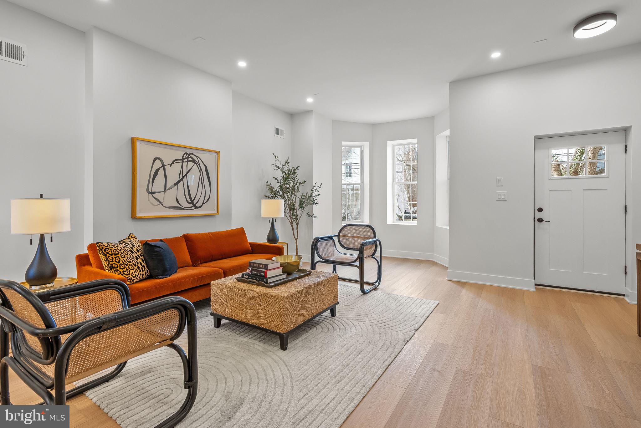 226 West Rittenhouse Street Philadelphia, PA 19144 - Photo 1 of 39 a living room with furniture and a wooden floor