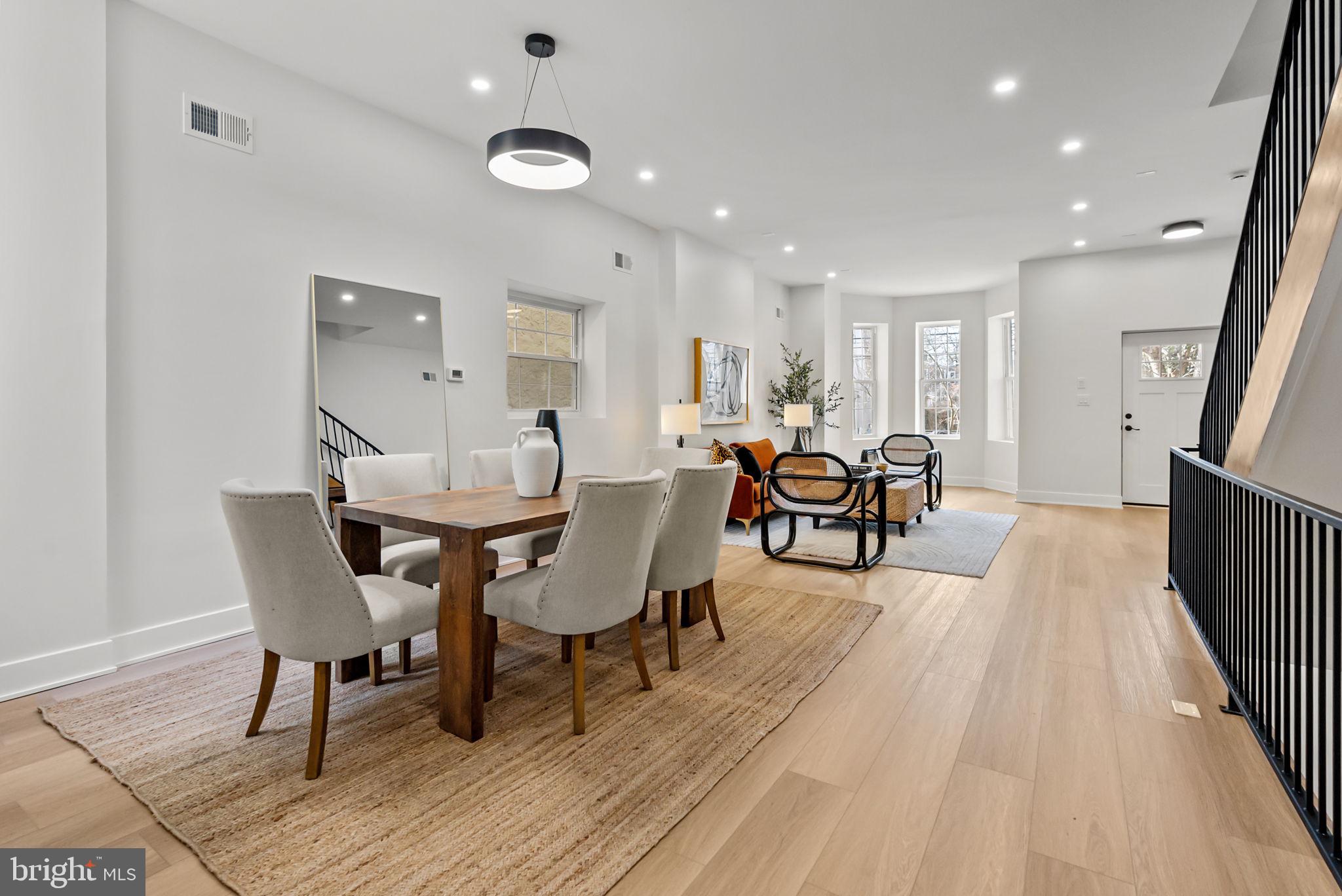 226 West Rittenhouse Street Philadelphia, PA 19144 - Photo 4 of 39 a view of a dining room with furniture and wooden floor