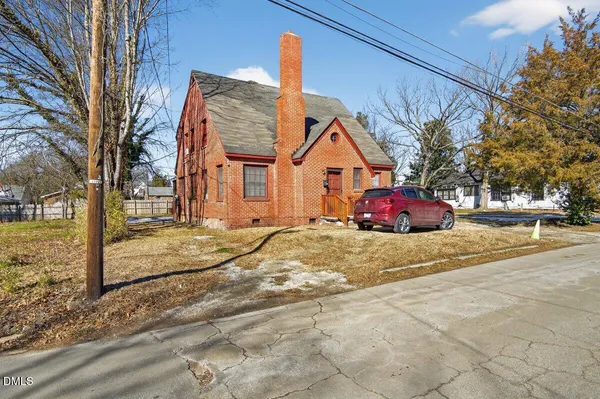 a house with trees in front of it