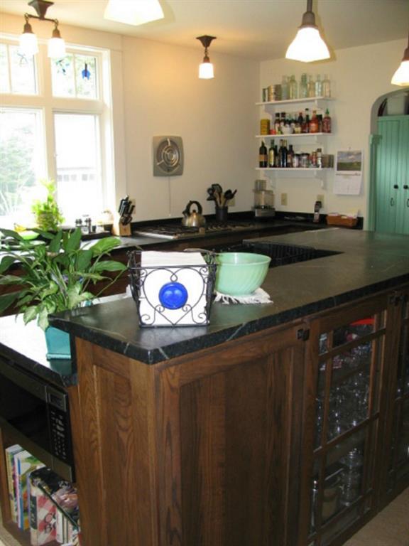 18 Bama Road Lakeville, ME 04487 - Photo 12 of 35 The custom oak cabinetry, commercial...