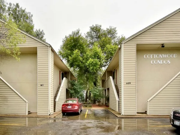 a car parked in front of a house