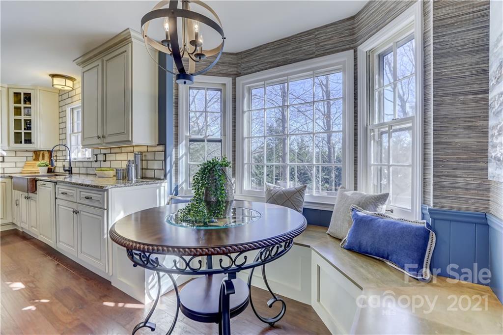 6601 Sharon Road Charlotte, NC 28210 - Photo 12 of 46 a view of a dining room with furniture window and outside view