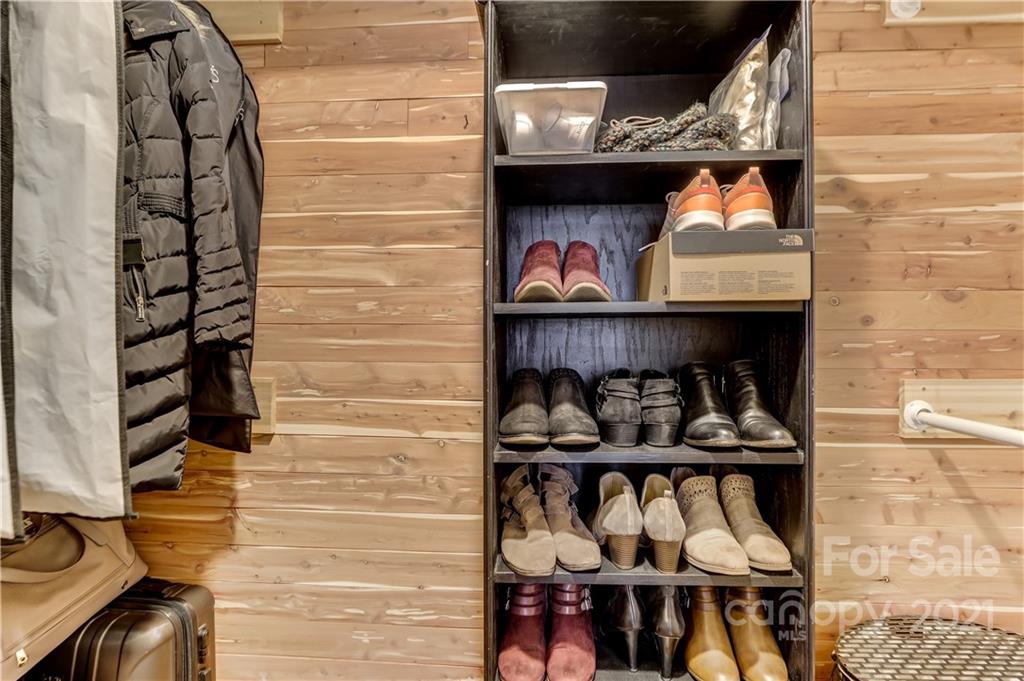 6601 Sharon Road Charlotte, NC 28210 - Photo 23 of 46 a front view of a fireplace with lots of different colored cloths