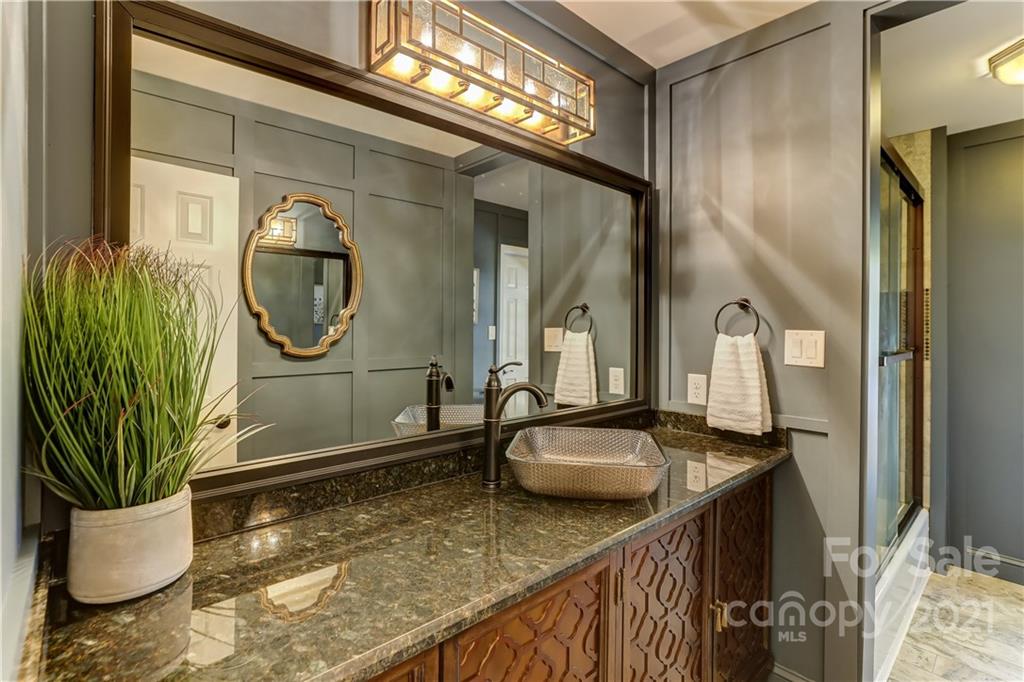 6601 Sharon Road Charlotte, NC 28210 - Photo 26 of 46 a view of a living room and bathroom