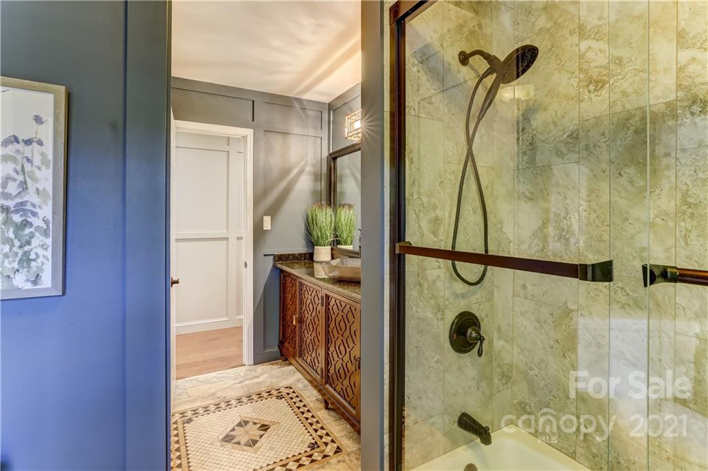 6601 Sharon Road Charlotte, NC 28210 - Photo 27 of 46 a bathroom with a shower