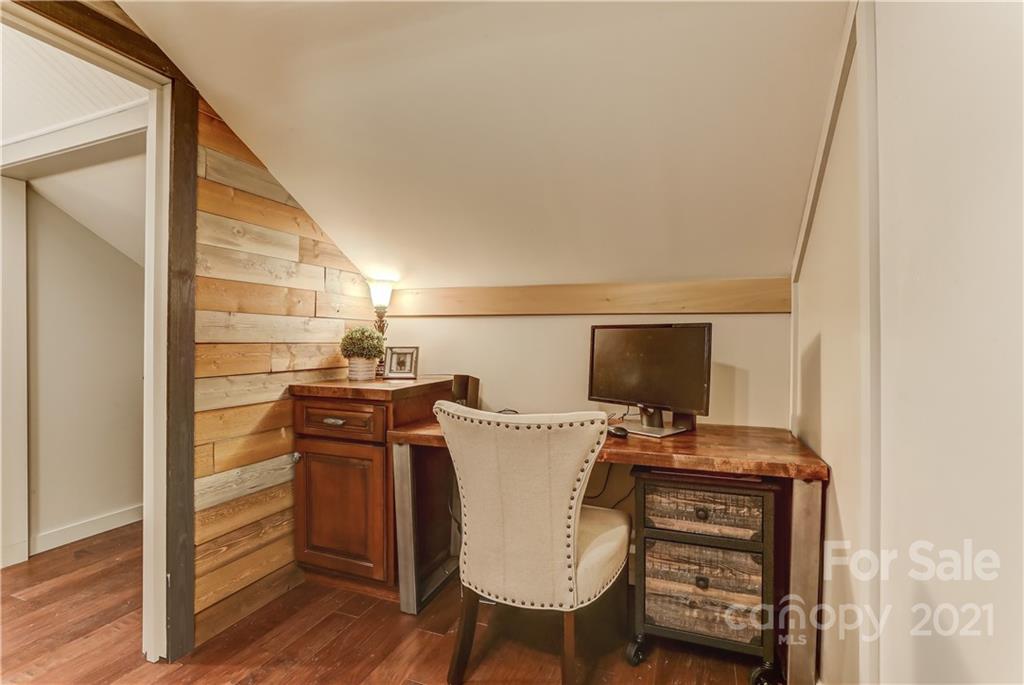 6601 Sharon Road Charlotte, NC 28210 - Photo 30 of 46 a view of workspace with wooden floor