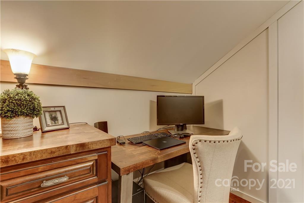 6601 Sharon Road Charlotte, NC 28210 - Photo 31 of 46 a view of a workspace with furniture