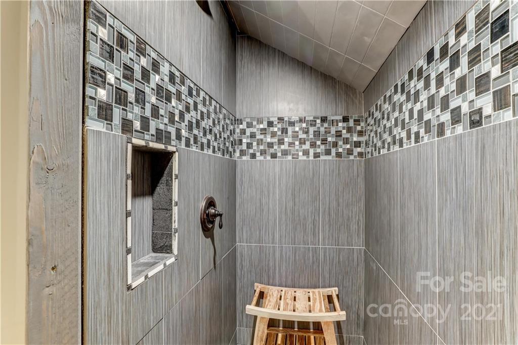 6601 Sharon Road Charlotte, NC 28210 - Photo 35 of 46 a bathroom with a shower