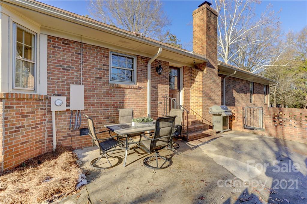 6601 Sharon Road Charlotte, NC 28210 - Photo 38 of 46 a view of backyard with outdoor seating