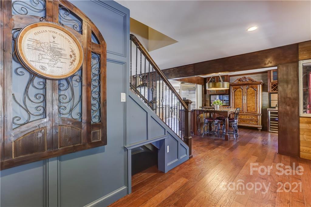 6601 Sharon Road Charlotte, NC 28210 - Photo 4 of 46 a view of entryway with wooden floor