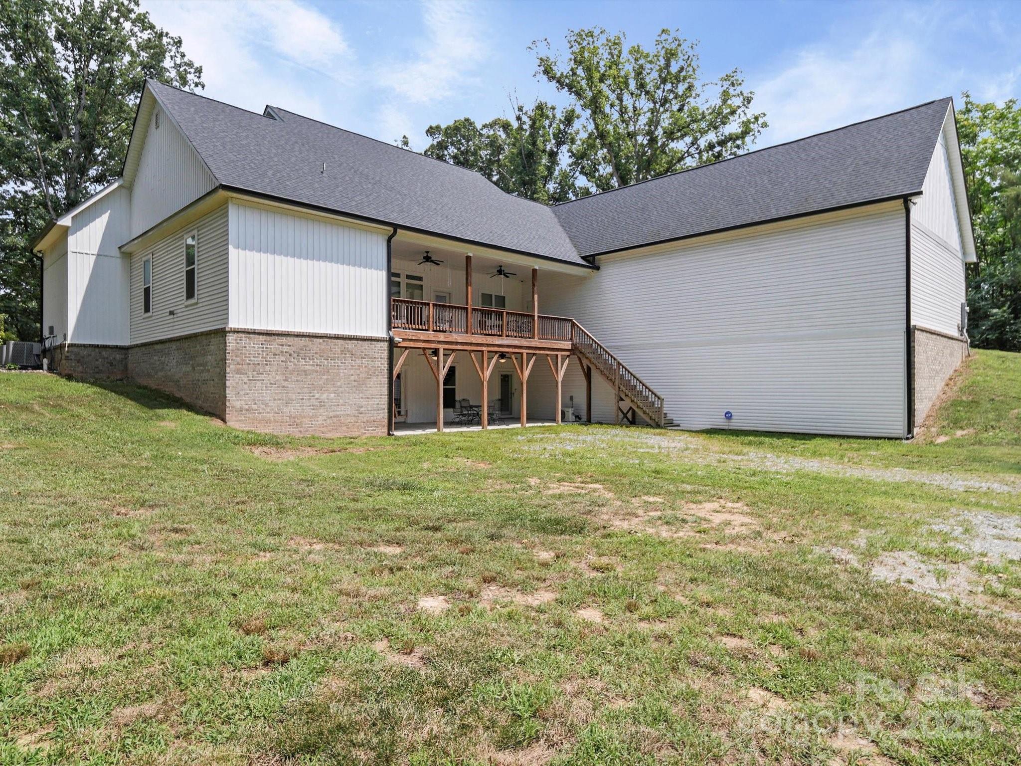 1421 Hamilton Crossroads Road Marshville, NC 28103 - Photo 12 of 29 a house with a yard