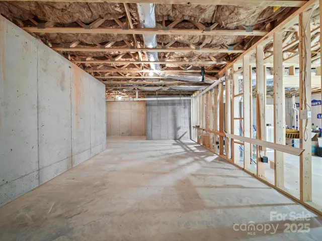a view of a room with lots of wooden walls